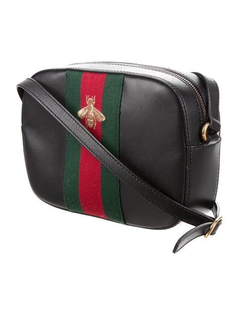 black gucci bee bag|Gucci bee crossbody bag.